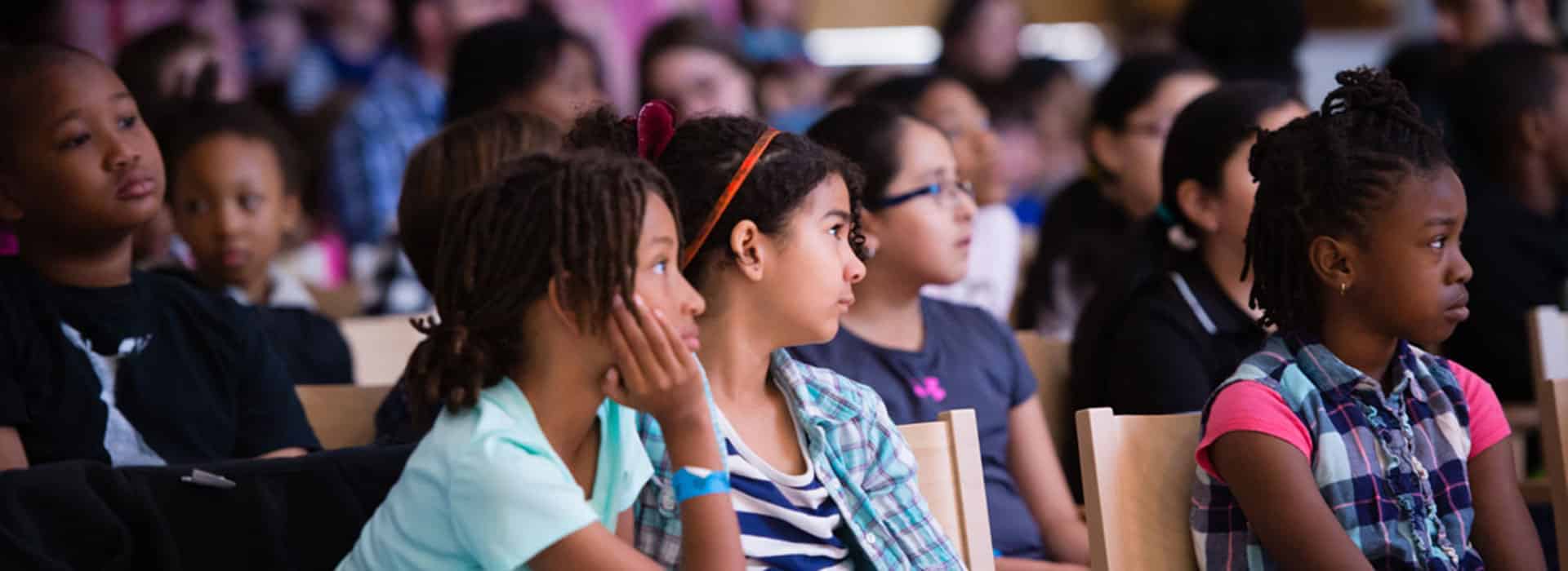 School children watching intently