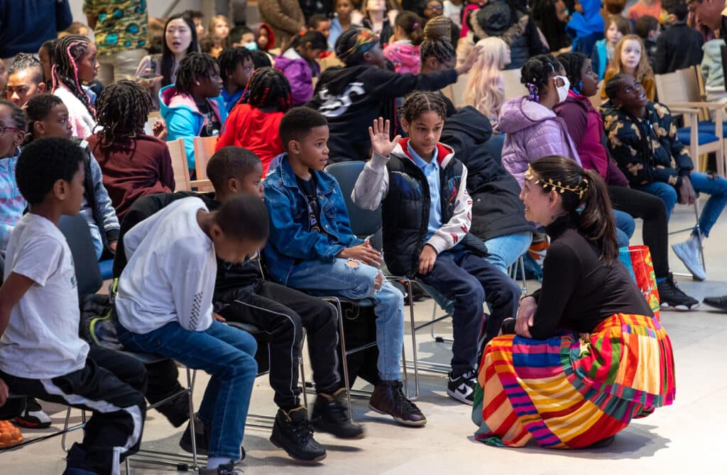 School children asking questions to a member of the Washington Bach Consort