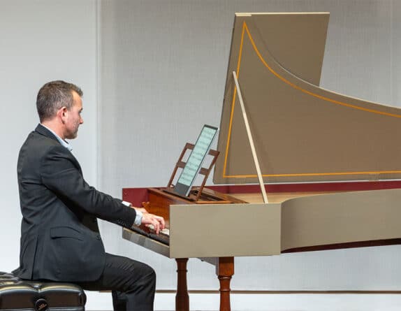 Adam Pearl playing the harpsichord